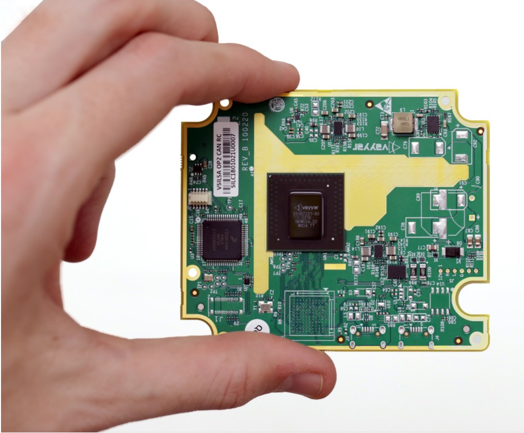 Automotive-grade 60 GHz imaging radar sensor board held in a hand